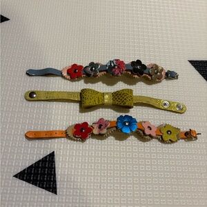 Soft Leather flowers & bow bracelets handmade in Italy. $40 each. NWOT.